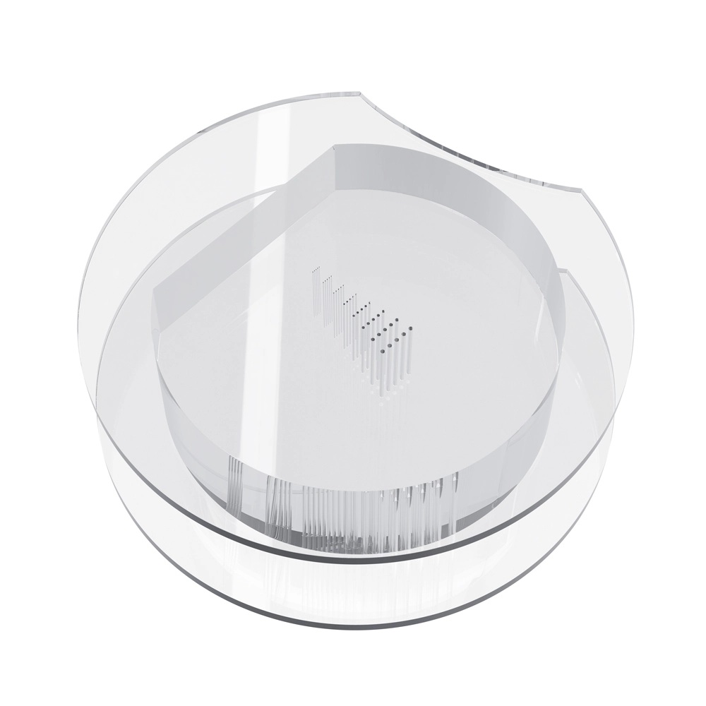 The part consists of two transparent plastic discs with one side cut off, forming an Oreo-like top and bottom, and a thick cylinder having one flat side and 8 rows of 5 holes with descending diameters.